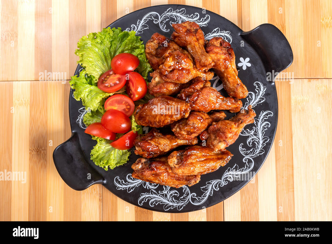 Chicken wings in sweet and sour sauce Stock Photo Alamy