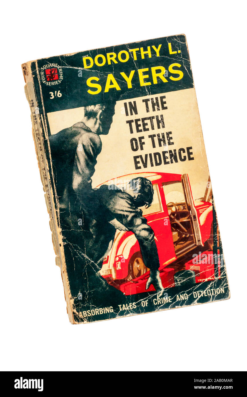 An old, battered paperback copy of In The Teeth of The Evidence by Dorothy L Sayers. A collection of short crime stories, First published in 1939. Stock Photo