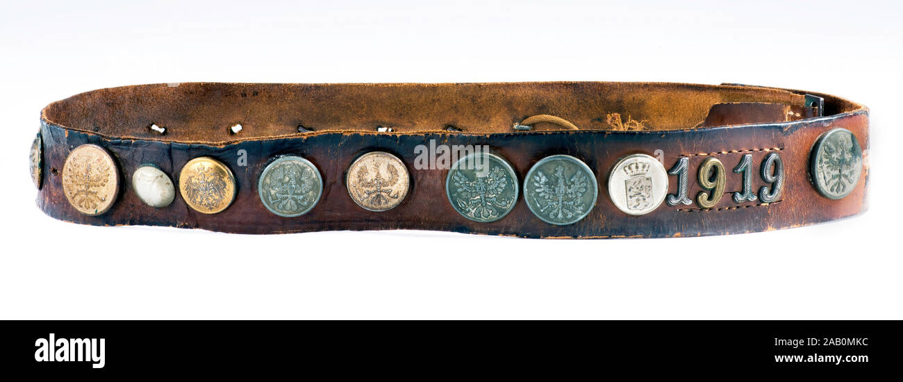 World War One hate belt dated 1918. American soldiers would bring back leather belts of enemy buttons at end of war. Stock Photo