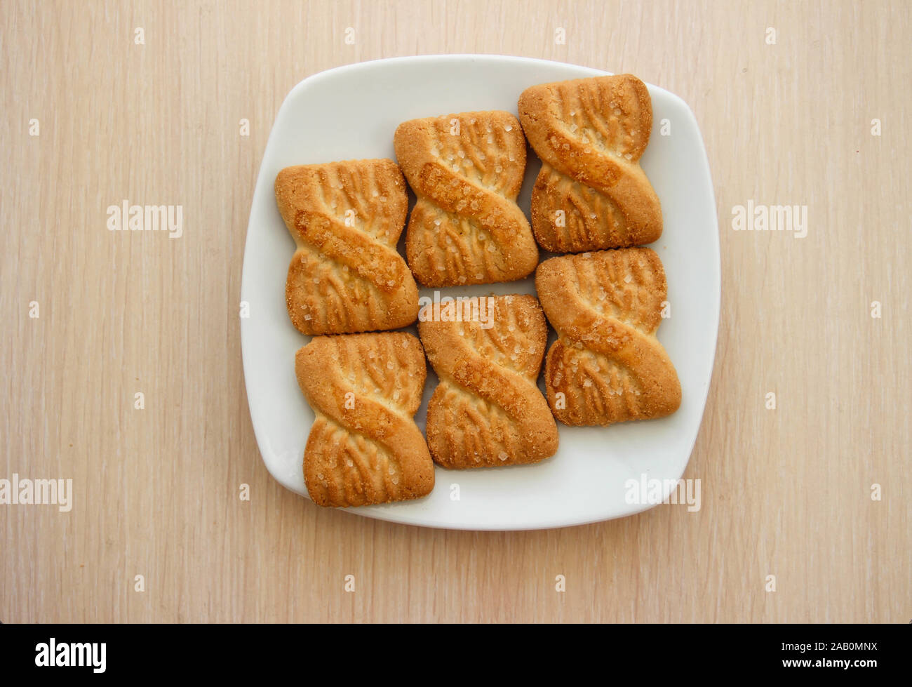 The photo of a pile of  cookies or shortcake biscuits on the plate. National Cookie Day background Stock Photo