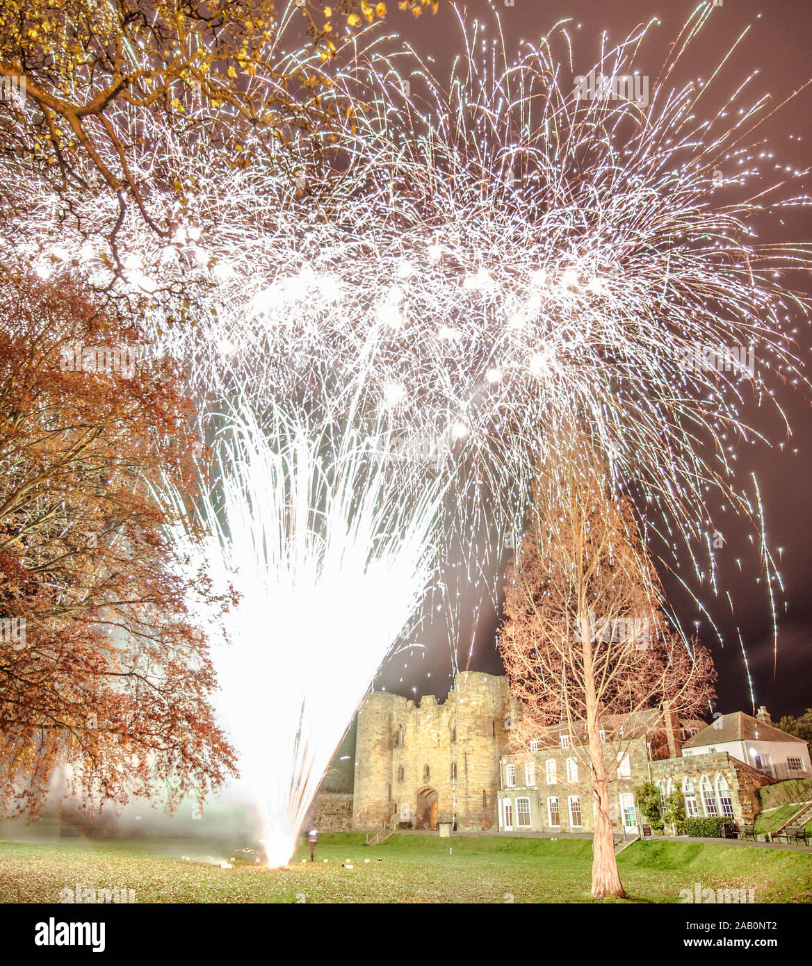 Tonbridge Castle Fireworks, Kent, United Kingdom,. 24 November 2019.  lit up by fireworks to mark the switching on of the Christmas Lights. Stock Photo