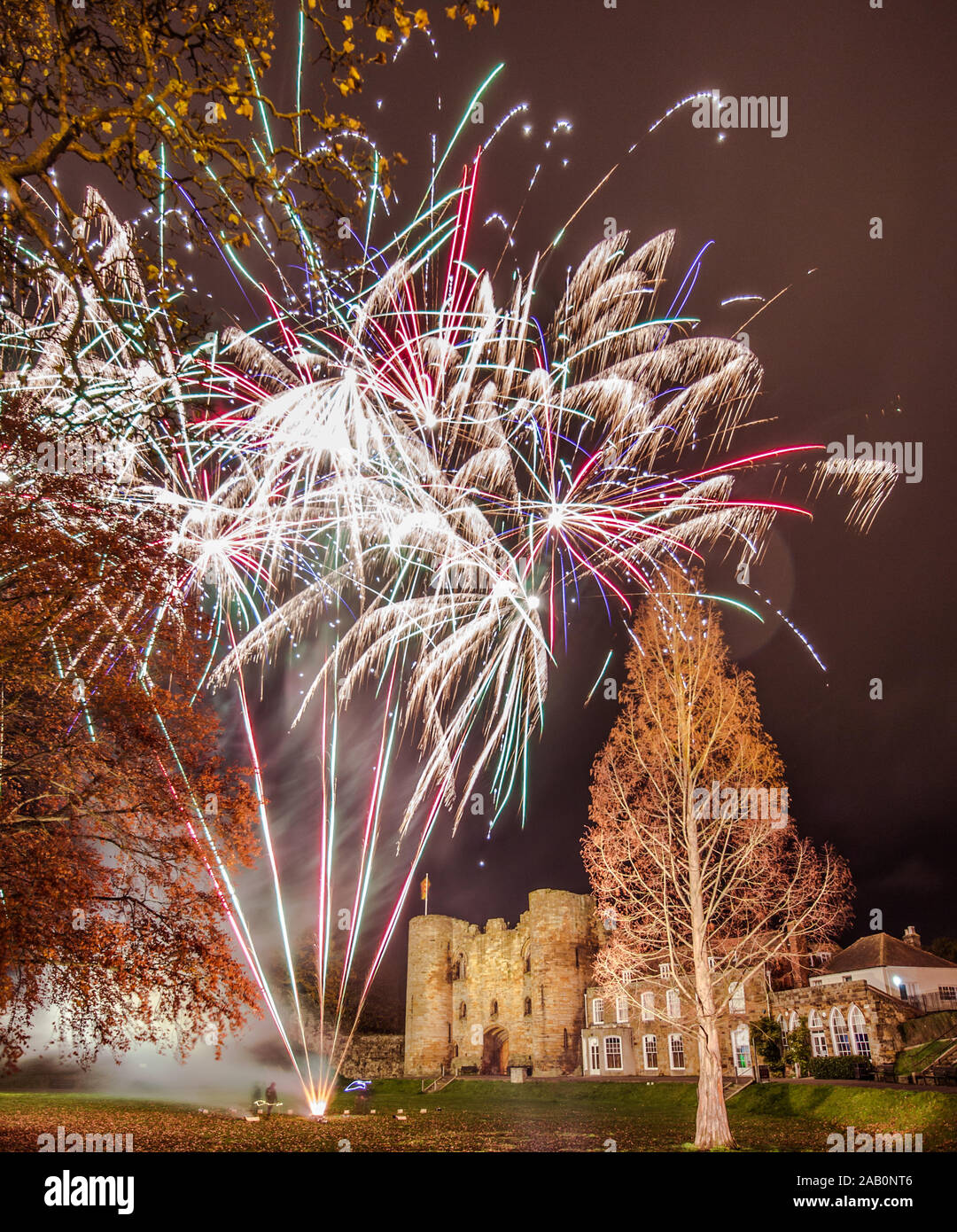Tonbridge Castle Fireworks, Kent, United Kingdom,. 24 November 2019.  lit up by fireworks to mark the switching on of the Christmas Lights. Stock Photo