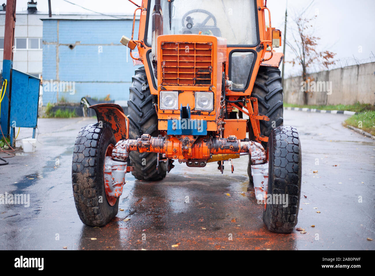 Internal combustion engine at the tractor. The inside of the engine mechanism in heavy equipment. Wires and fuel valves of an old tractor. Machine und Stock Photo