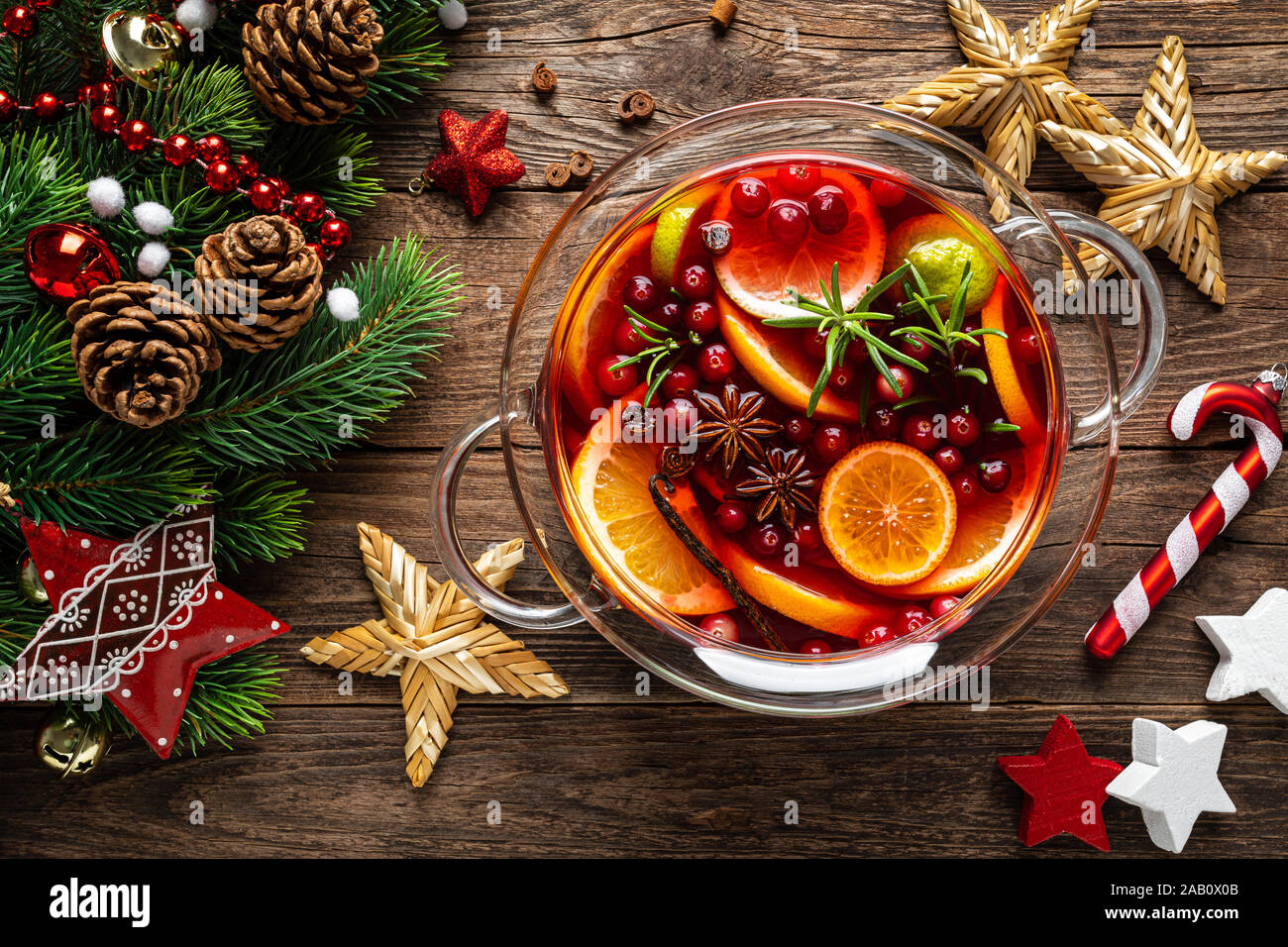 Christmas punch. Festive red hot toddy cocktail, drink with cranberries