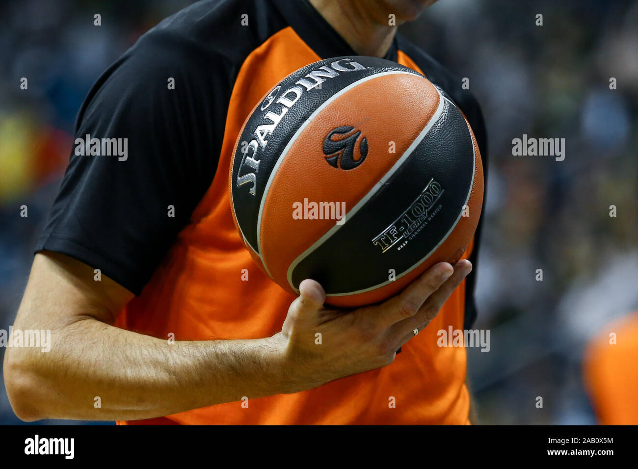 Berlin, Germany, October 04, 2019: a referee holds the official basket game ball during a EuroLeague match between Alba Berlin and Zenit St Petersburg Stock Photo