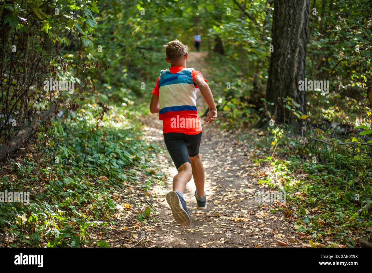 Sports running competition among children. Cross country running