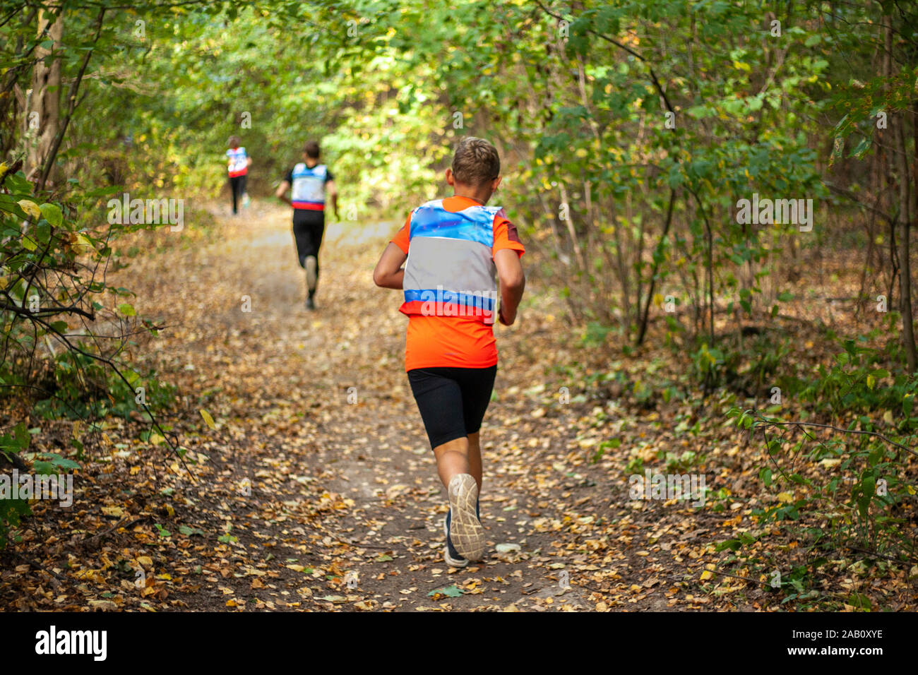 Sports running competition among children. Cross country running