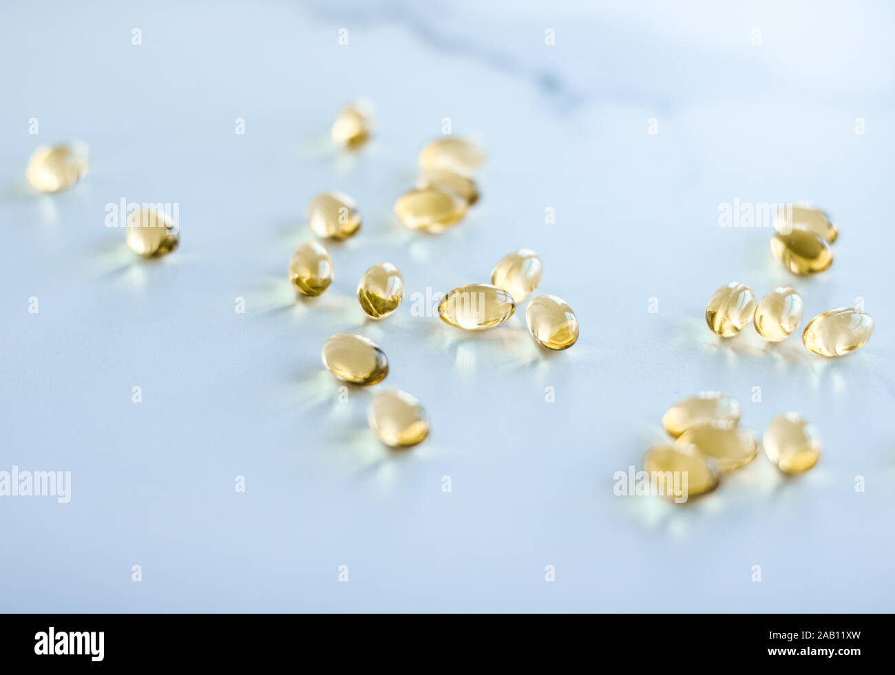 Pharmaceutical, branding and science concept Vitamin D and golden