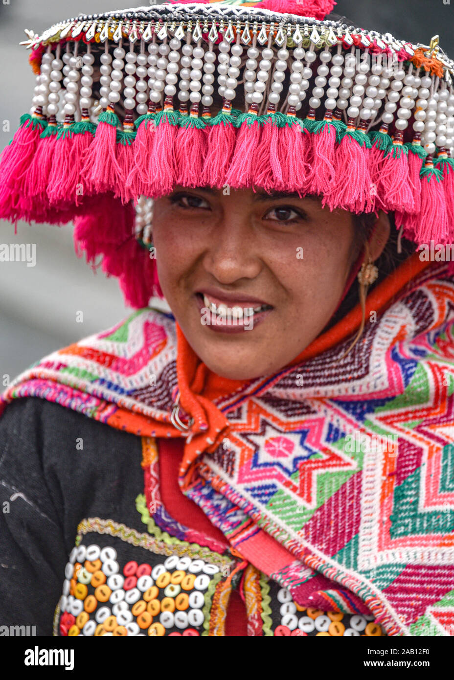 Lima, Peru - Nov 17, 2019:  An Andean girl dressed in traditional clothing for a procession in Lima's Plaza de Armas Stock Photo