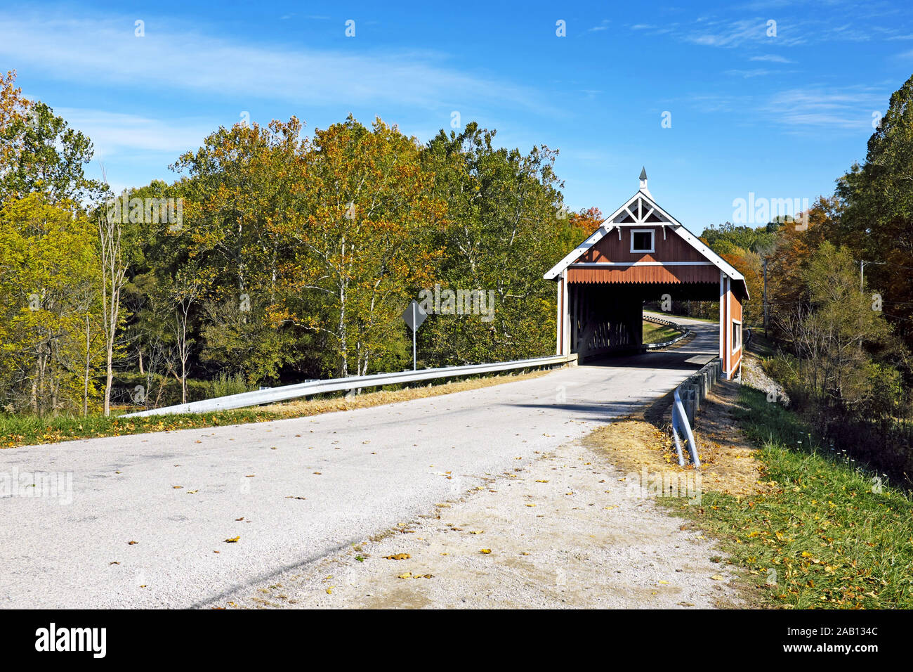 One of 19 covered bridges in Ashtabula County, the Netcher Road wooden covered bridge in Jefferson Township, Ohio, USA is of Neo-Victorian design. Stock Photo