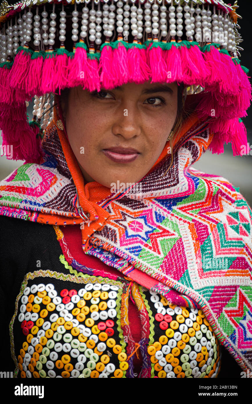 Lima, Peru - Nov 17, 2019:  An Andean girl dressed in traditional clothing for a procession in Lima's Plaza de Armas Stock Photo