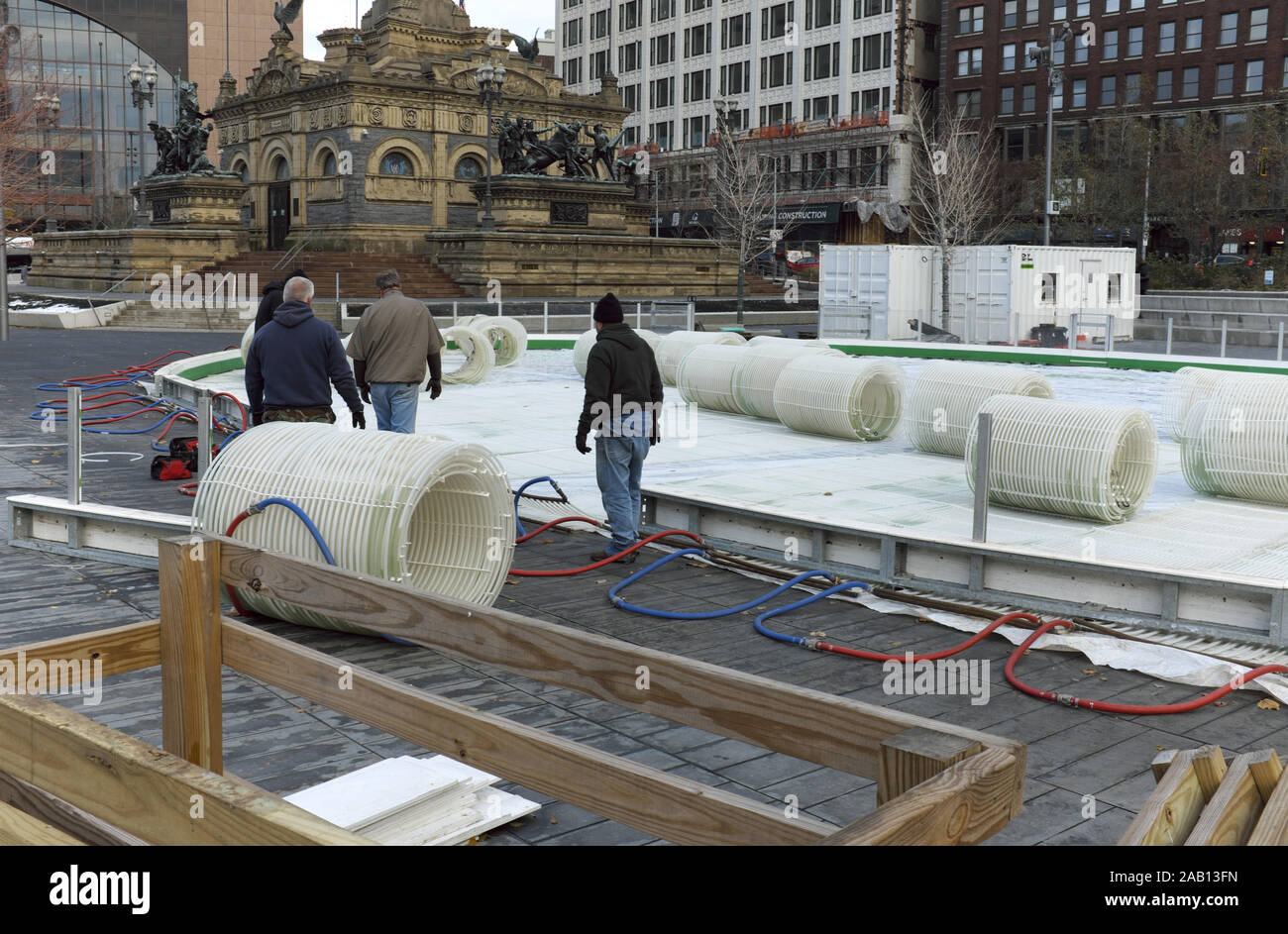 Workers on Public Square are constructing the seasonal ice skating rink in downtown Cleveland, Ohio, USA. Stock Photo
