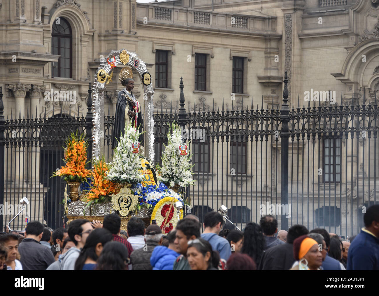 Lima, Peru - Nov 17, 2019: Crowds attend the procession for San Martin de Porres in Lima's main square Stock Photo