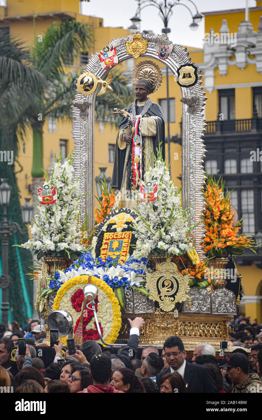 Lima, Peru - Nov 17, 2019: Crowds attend the procession for San Martin de Porres in Lima's main square Stock Photo