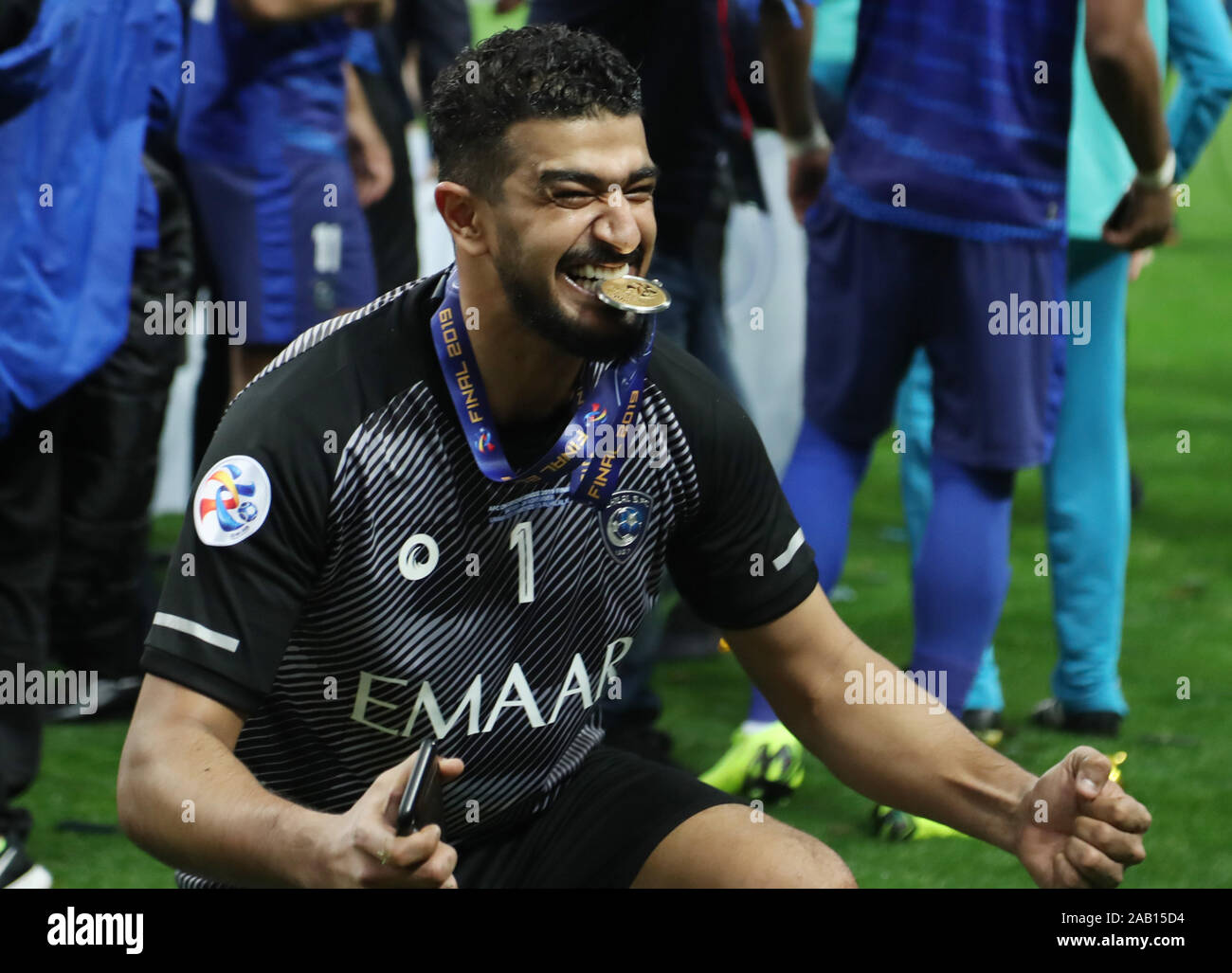 Saitama Japan 24th Nov 19 Saudi Arabia S Al Hilal Sfc Goalie Abdullah Almuaiouf Bites The Gold Medal As The Team Clinched Victory Of Afc Champions League At The Final In Saitama Suburban