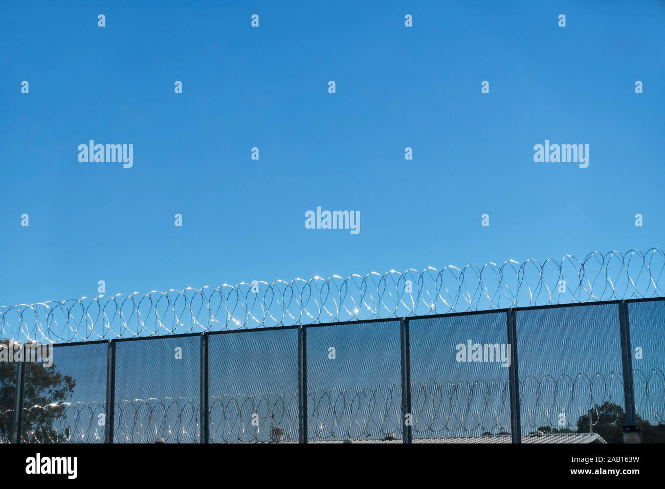 Razor Wire glistening in the winter sun at Tamworth  Prison NSW Australia. Stock Photo