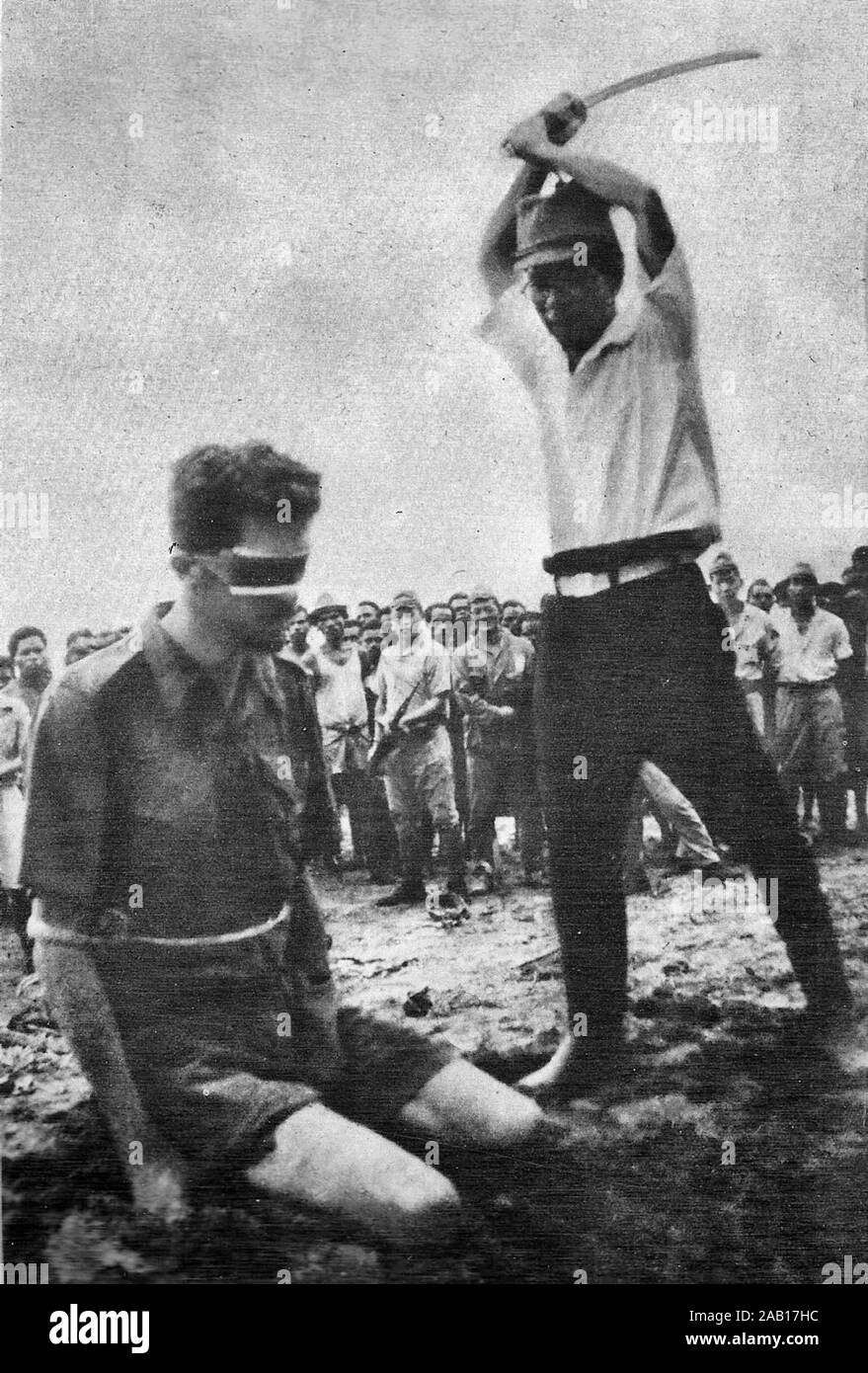 Aitape, New Guinea. 24 October 1943. A photograph found on the body of a dead Japanese soldier showing NX143314 Sergeant (Sgt) Leonard G. Siffleet of 'M' Special Unit, wearing a blindfold and with his arms tied, about to be beheaded with a sword by Yasuno Chikao. The execution was ordered by Vice Admiral Kamada, the commander of the Japanese Naval Forces at Aitape. Sgt Siffleet was captured with Private (Pte) Pattiwahl and Pte Reharin, Ambonese members of the Netherlands East Indies Forces, whilst engaged in reconnaissance behind the Japanese lines. Yasuno Chikao died before the end of the war Stock Photo