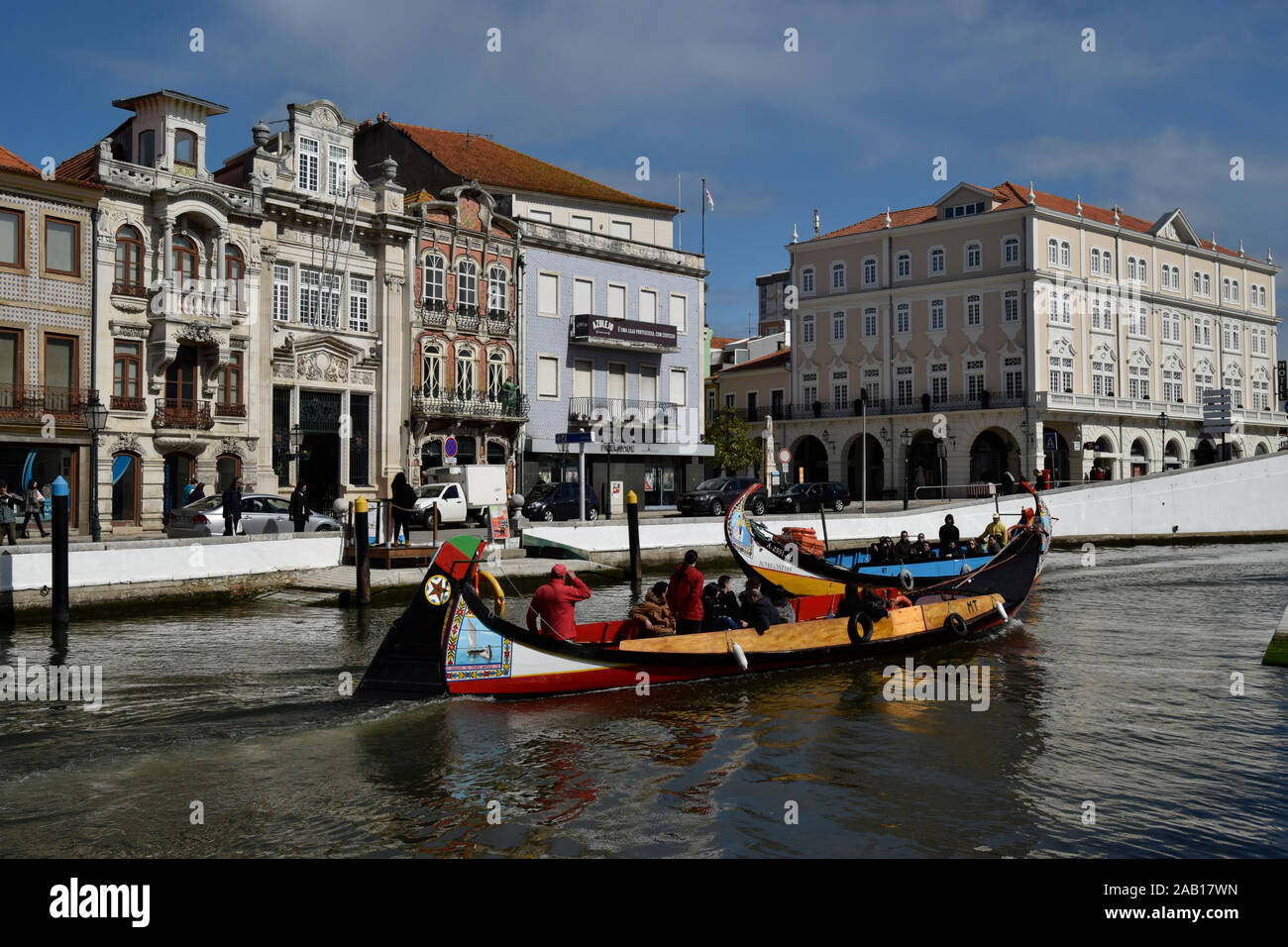 Tourists take a river tour on a Moliceiro canal boat Aveiro Portugal Stock Photo