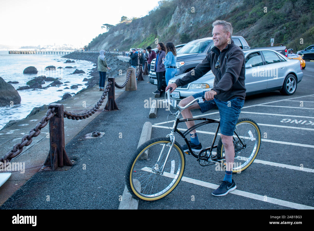 A man rides his bicycle at Fort Point in San Francisco. Stock Photo