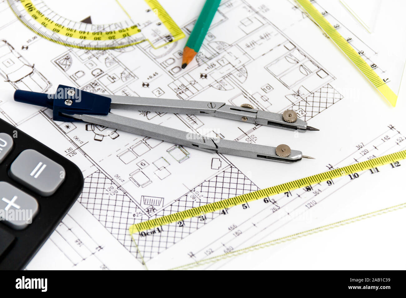 Photo of the Architectural project, pair of compasses, rulers and ...