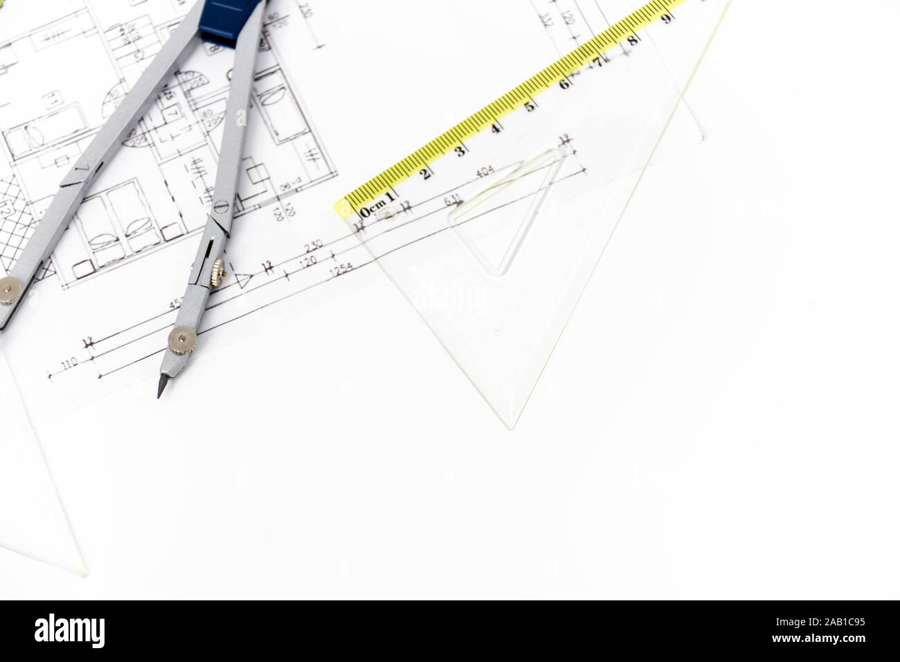 Photo of the Architectural project, pair of compasses, rulers and ...