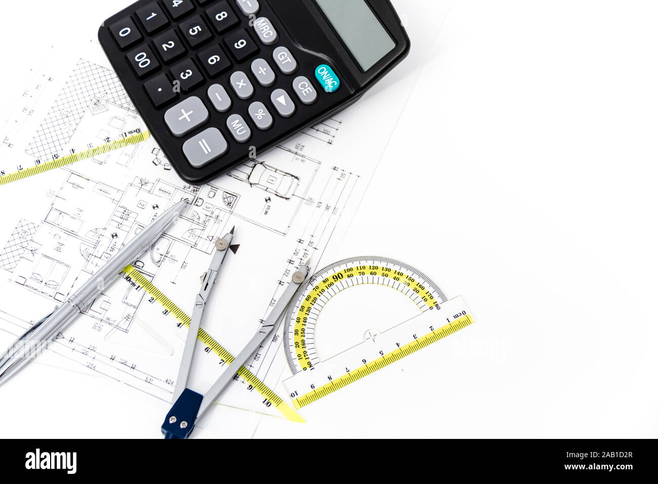 Photo of the Architectural project, pair of compasses, rulers and ...