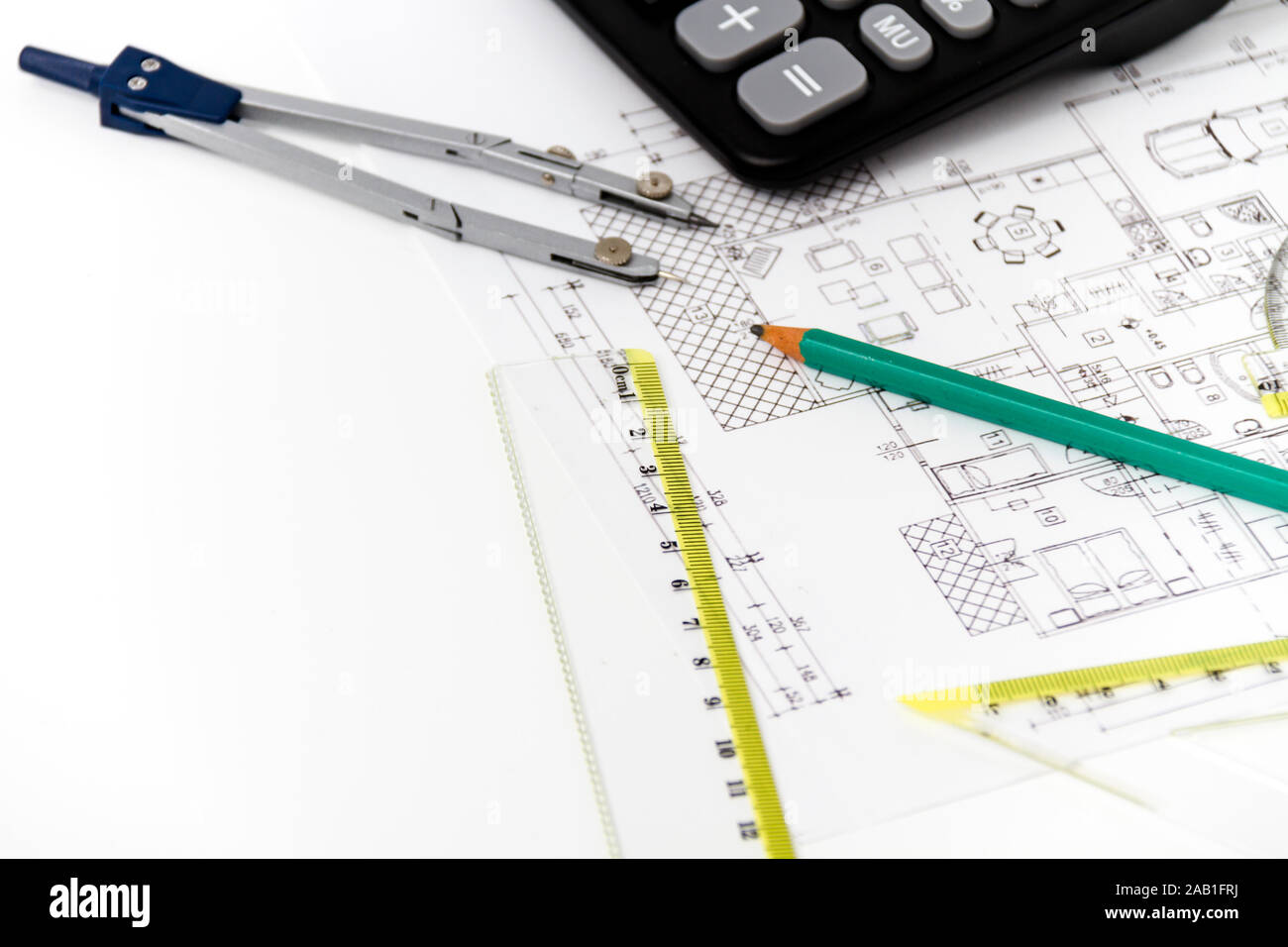 Photo of the Architectural project, pair of compasses, rulers and ...