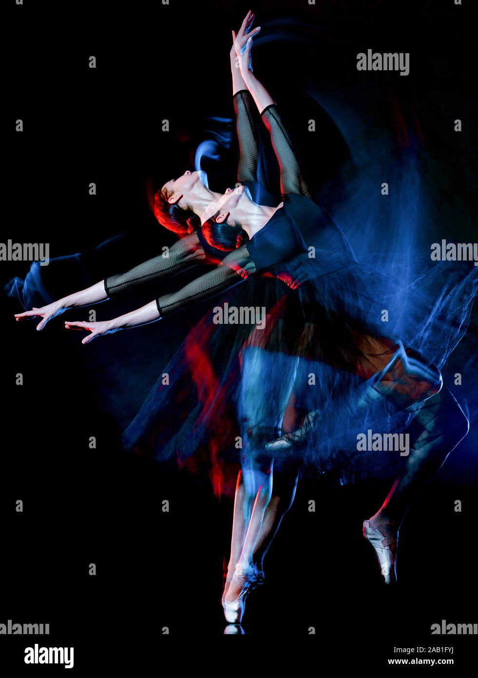 one caucasian woman ballerina classical ballet dancer dancing woman studio shot isolated on black bacground Stock Photo