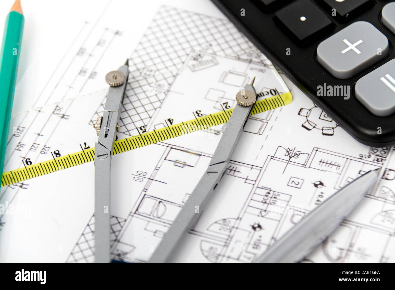 Photo of the Architectural project, pair of compasses, rulers and ...
