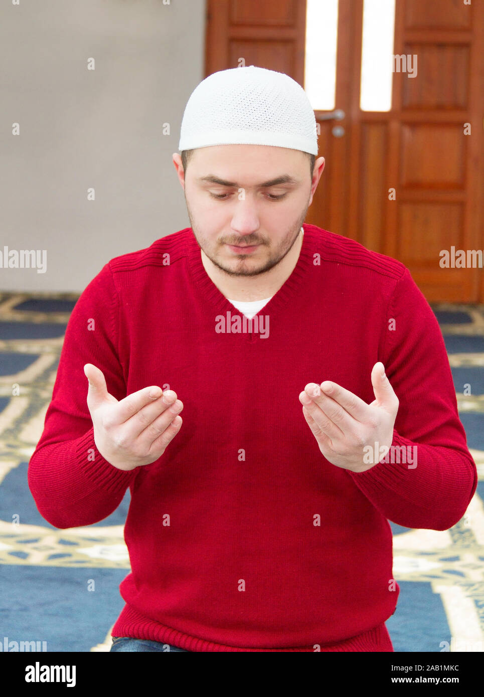 Photo of the Young muslim man showing Islamic prayer Stock Photo Alamy