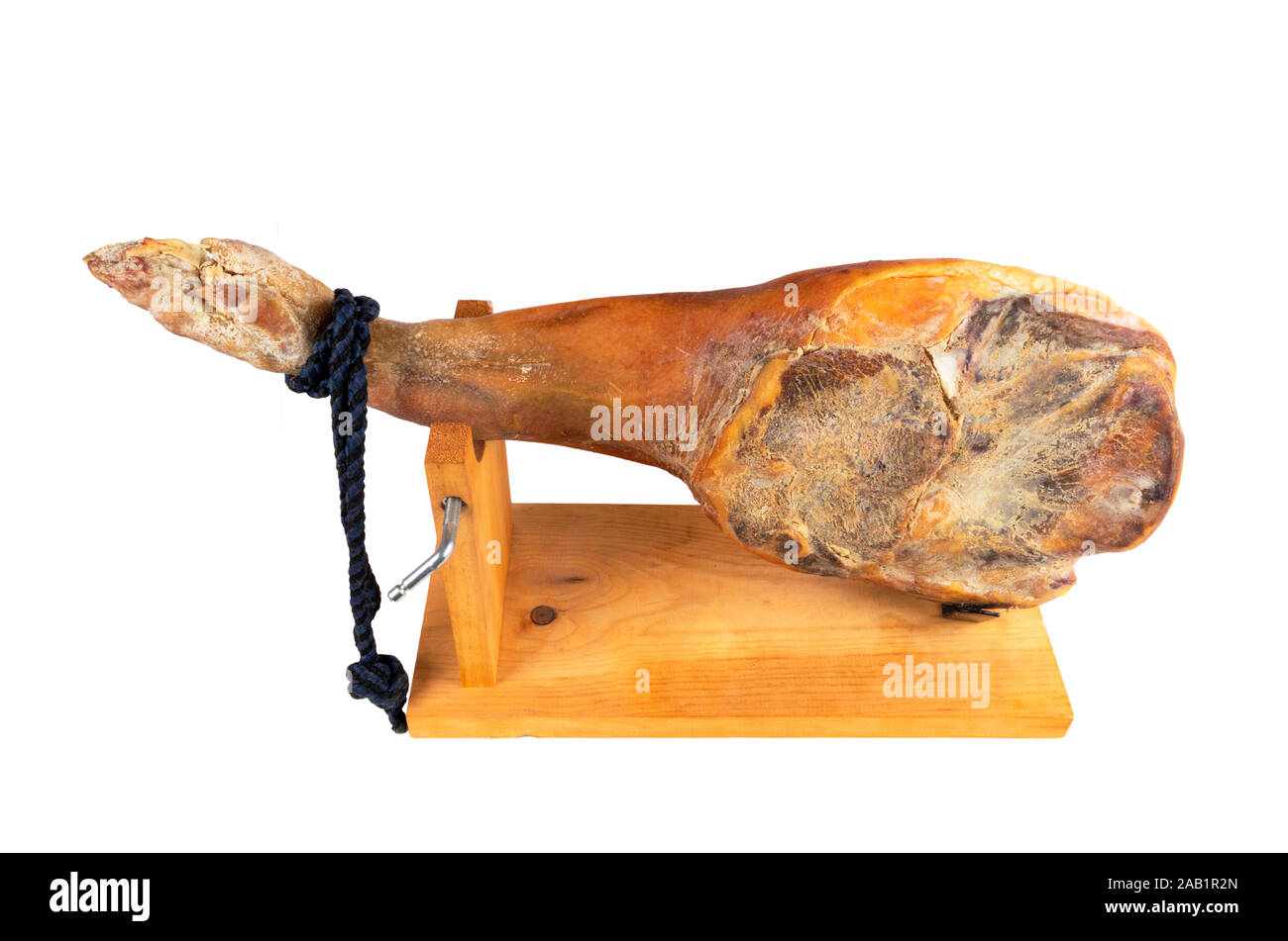Jamon serrano. A Spanish ham isolated on white background ...