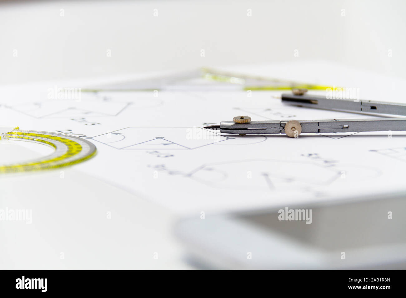 Drawing tools with compass, projects for construction Stock Photo - Alamy