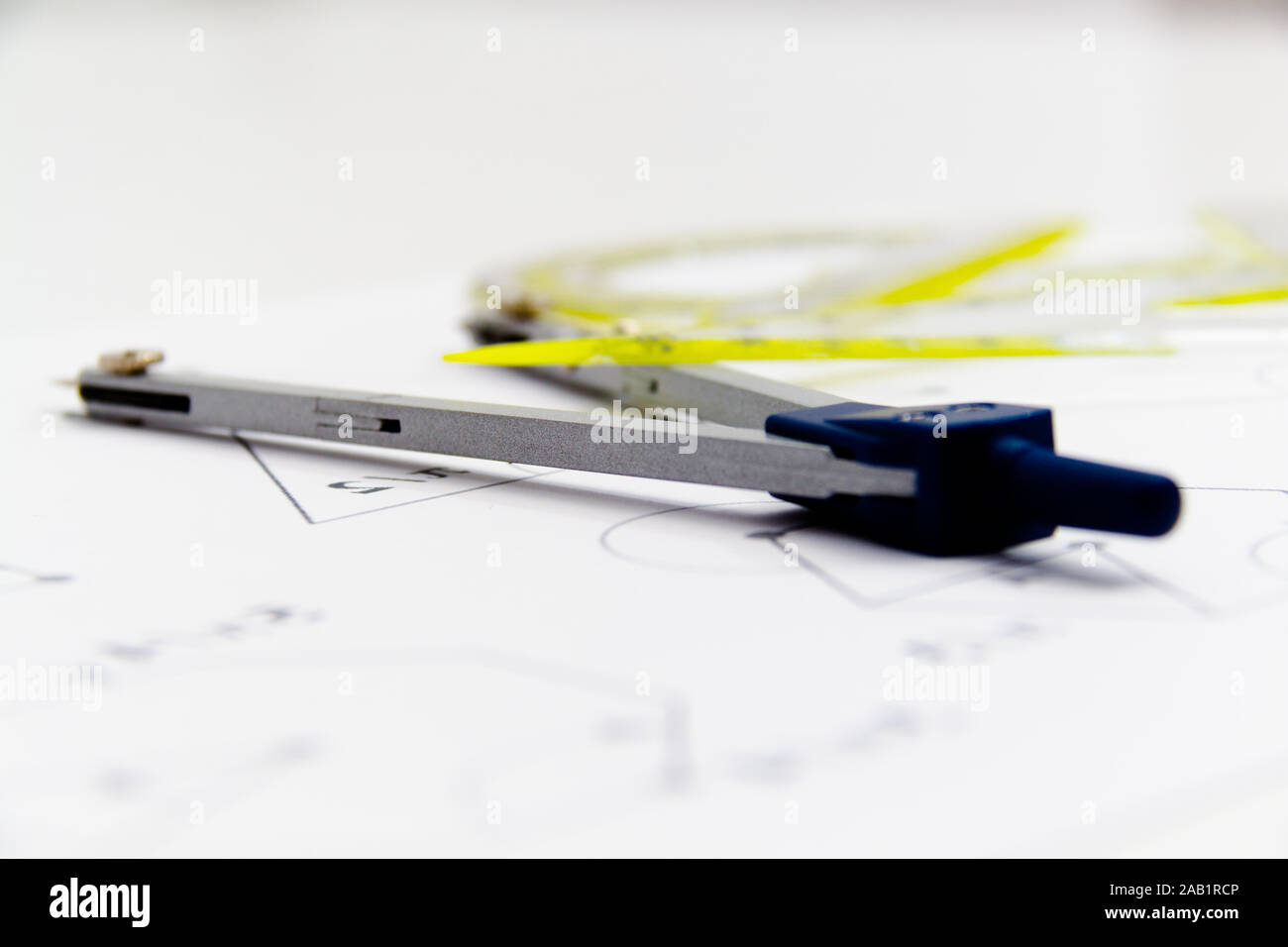 Drawing tools with compass, projects for construction Stock Photo - Alamy