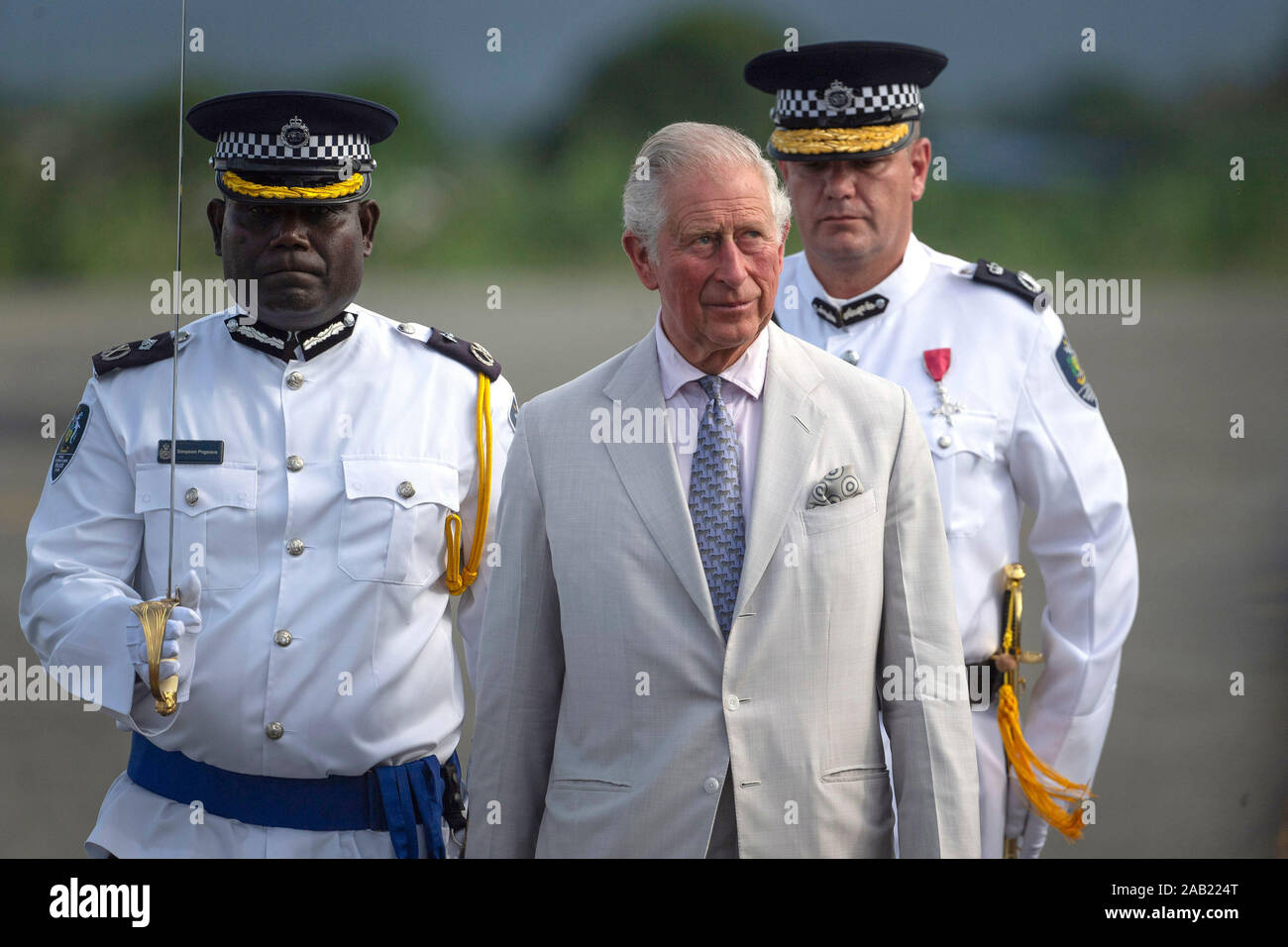 The Prince of Wales inspects the guard at Honiara International Airport in Honiara, as he prepares to depart following a three day royal visit to the Solomon Islands. PA Photo. Picture date: Monday November 25, 2019. See PA story ROYAL Charles. Photo credit should read: Victoria Jones/PA Wire Stock Photo