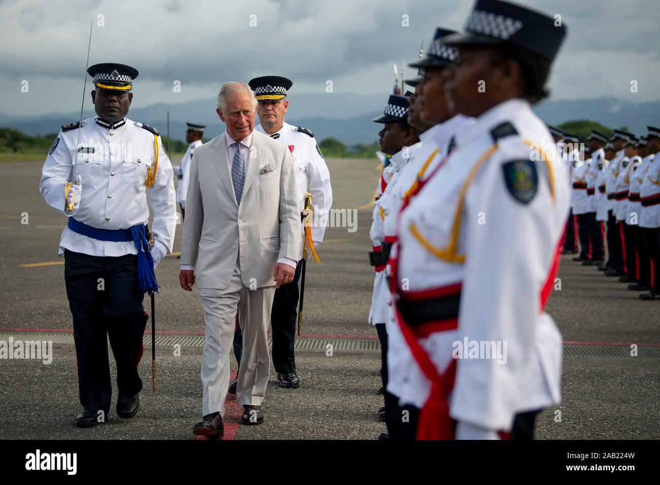 The Prince of Wales inspects the guard at Honiara International Airport in Honiara, as he prepares to depart following a three day royal visit to the Solomon Islands. PA Photo. Picture date: Monday November 25, 2019. See PA story ROYAL Charles. Photo credit should read: Victoria Jones/PA Wire Stock Photo