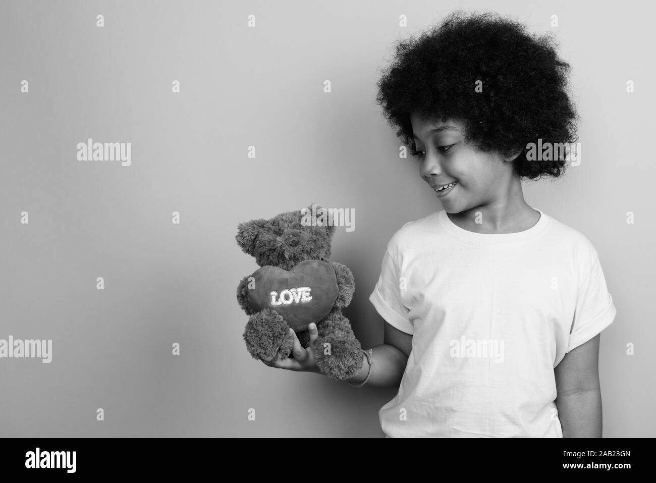Young Cute African Girl With Afro Hair In Black And White Stock