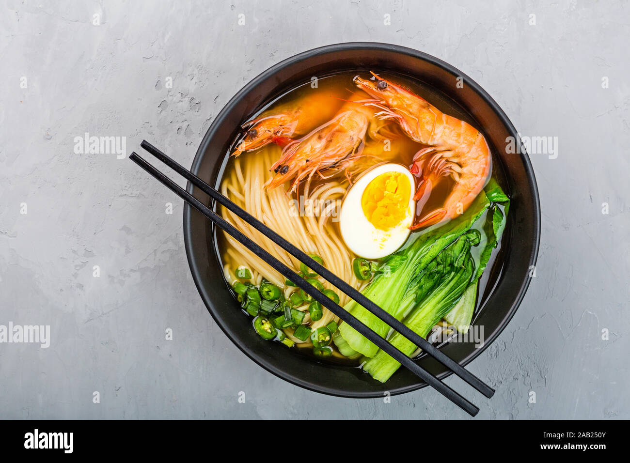 Download Asian Noodle Soup Ramen With Shrimp Vegetables And Egg In Black Bowl On Gray Concrete Background Flat Lay Top View Mockup Overhead Healthy Food Stock Photo Alamy