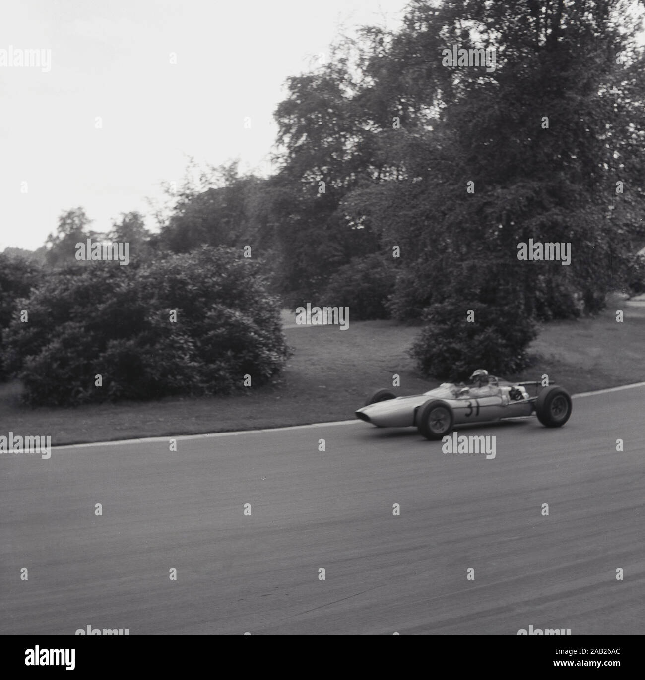 1960s, historical, motor racing at Crystal Palace race circuit in South London, London, England, UK, a racing car of the era going round a corner at the park circuit. Stock Photo