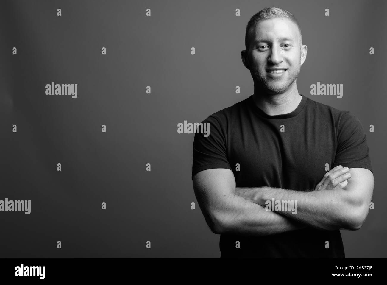 Portrait of muscular man in black and white Stock Photo - Alamy