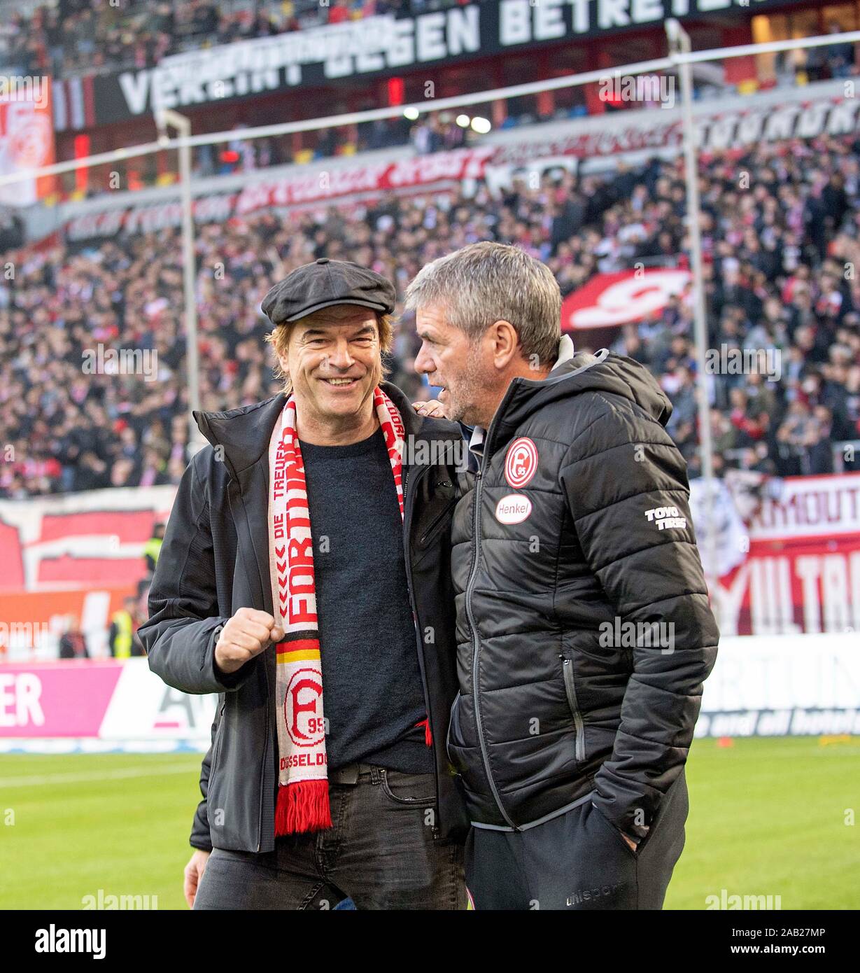 CAMPINO l. (Saenger der Toten Hosen) with D scarf and coach Friedhelm  FUNKEL (D). Soccer 1.
