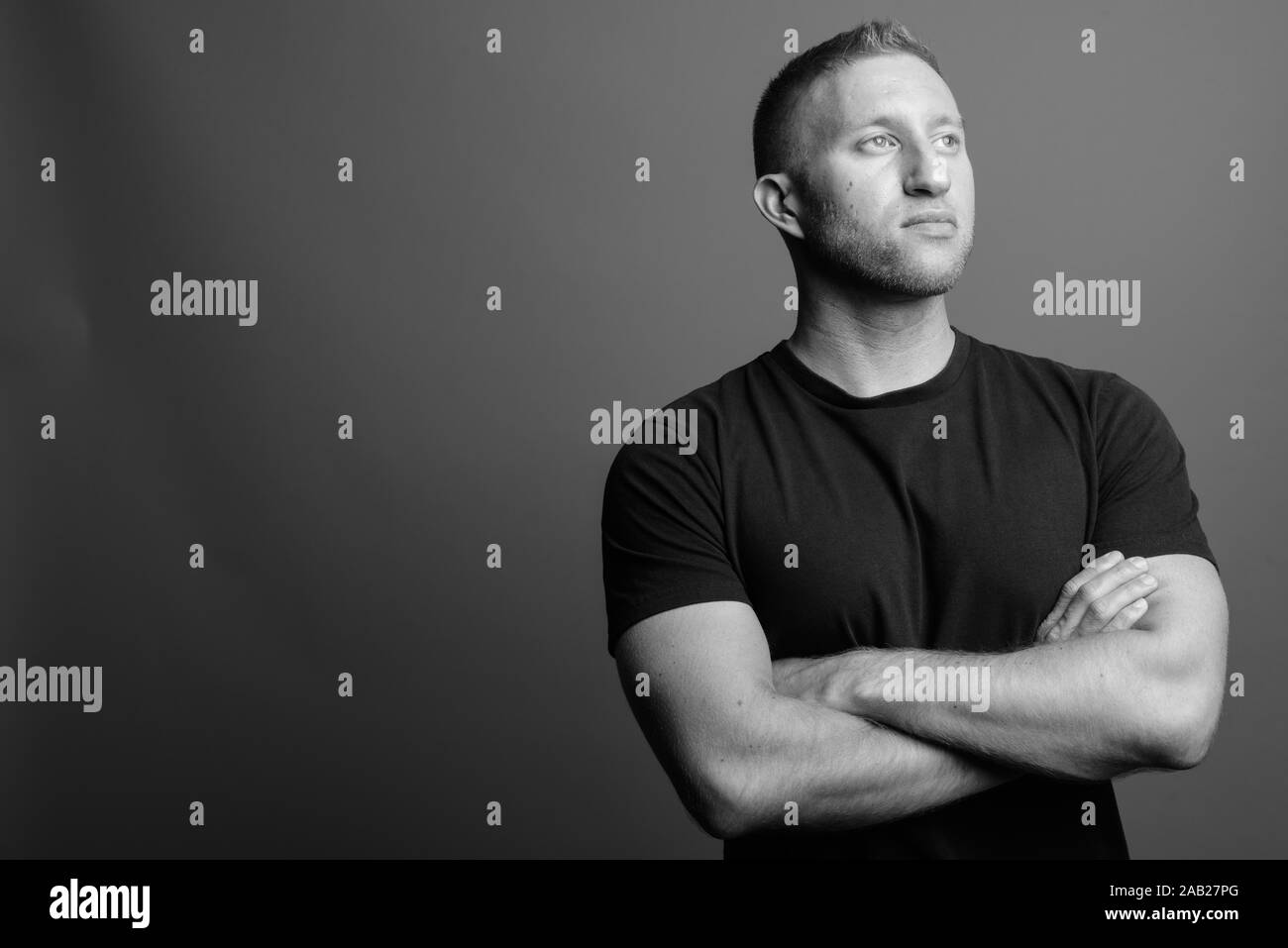 Portrait of muscular man in black and white Stock Photo - Alamy