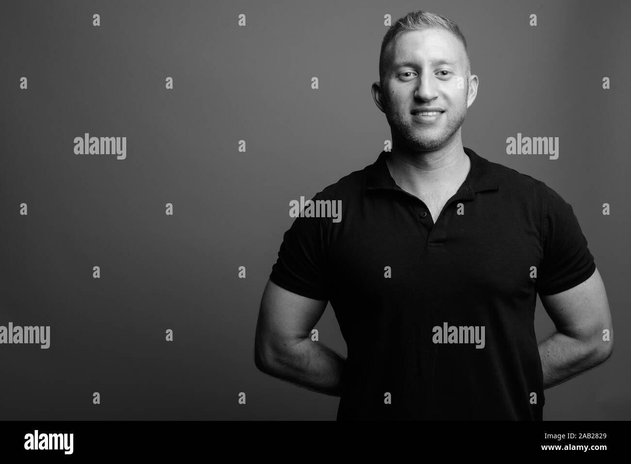 Portrait of muscular man in black and white Stock Photo - Alamy