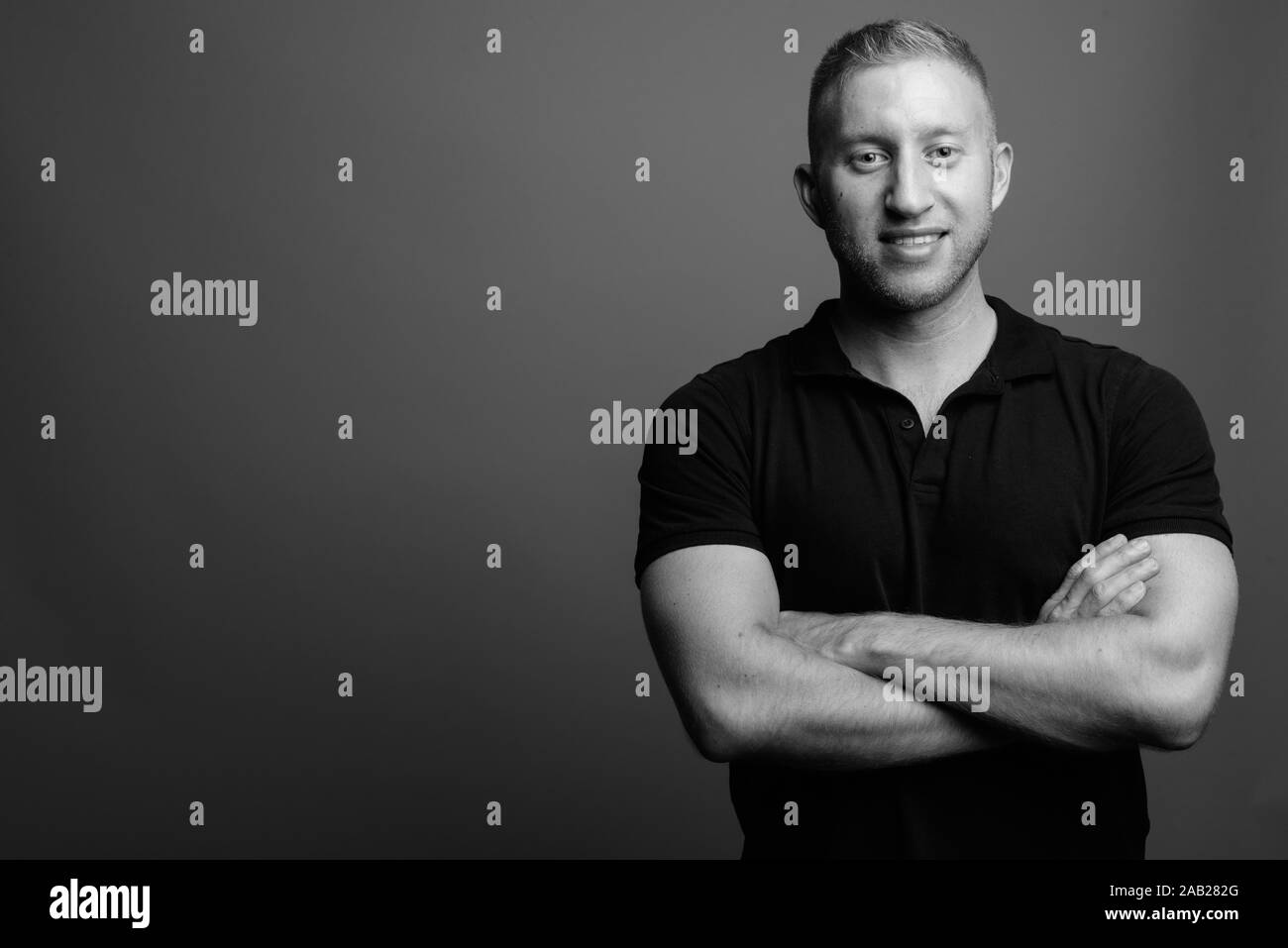 Portrait of muscular man in black and white Stock Photo - Alamy