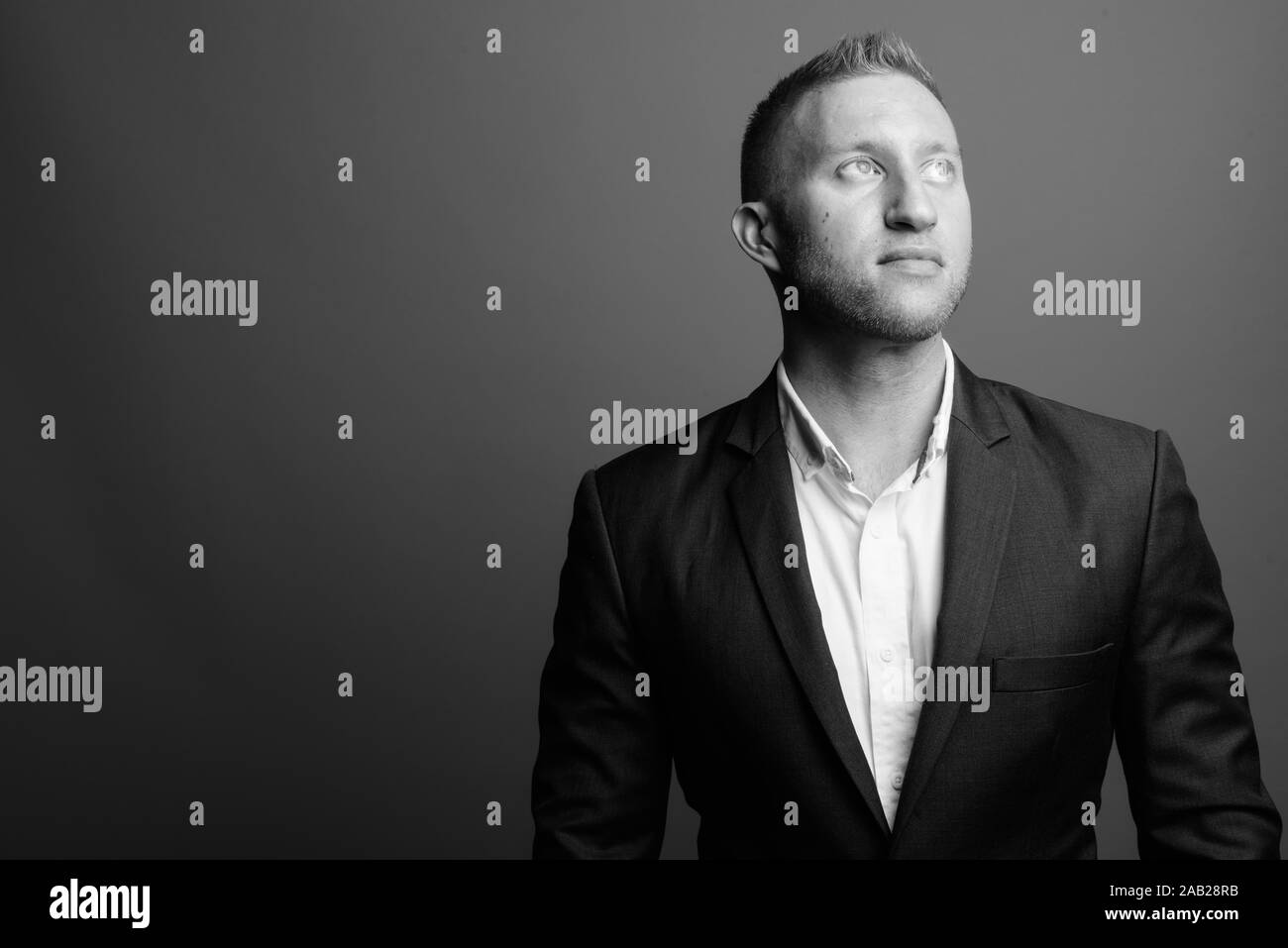 Muscular businessman Black and White Stock Photos & Images - Alamy