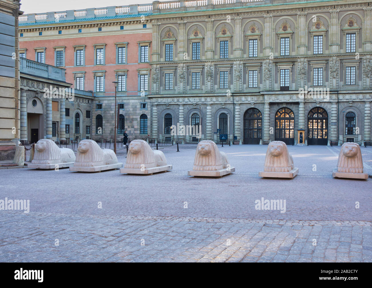 Stone lions as a protective security barrier, Royal Palace (Kungliga Slottet), Gamla Stan, Stockholm, Sweden Stock Photo