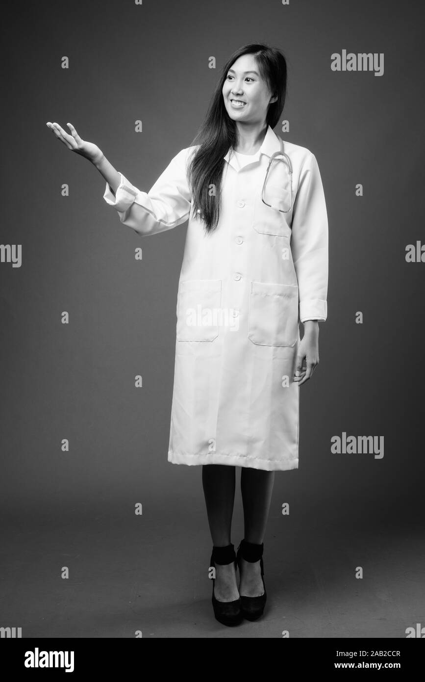 Young beautiful Asian woman doctor in black and white Stock Photo - Alamy