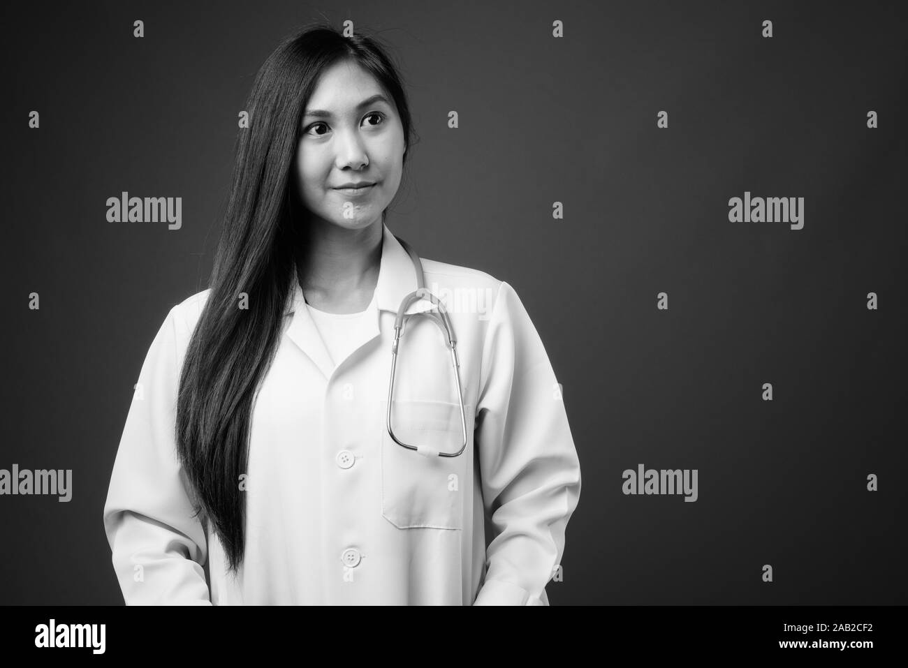 Young beautiful Asian woman doctor in black and white Stock Photo - Alamy