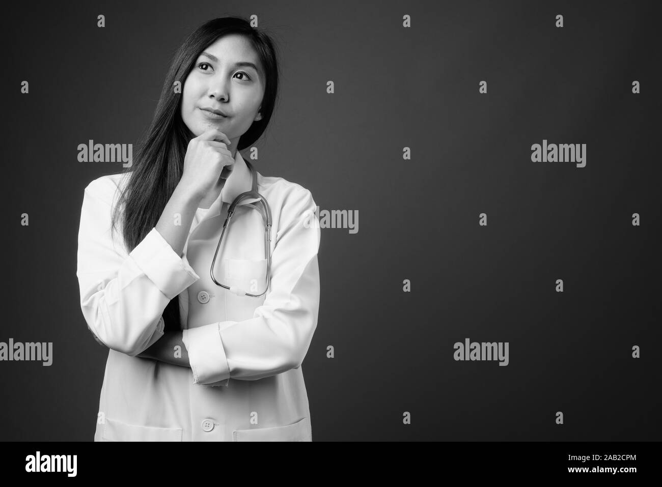 Young beautiful Asian woman doctor in black and white Stock Photo - Alamy
