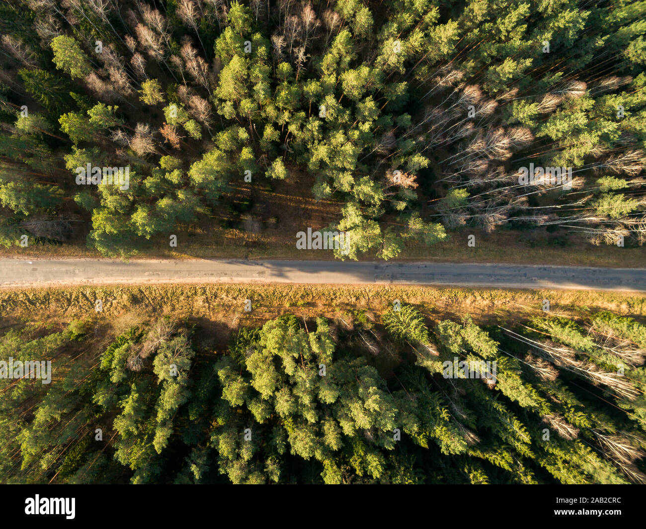 Asphalt road passing through hi-res stock photography and images - Alamy