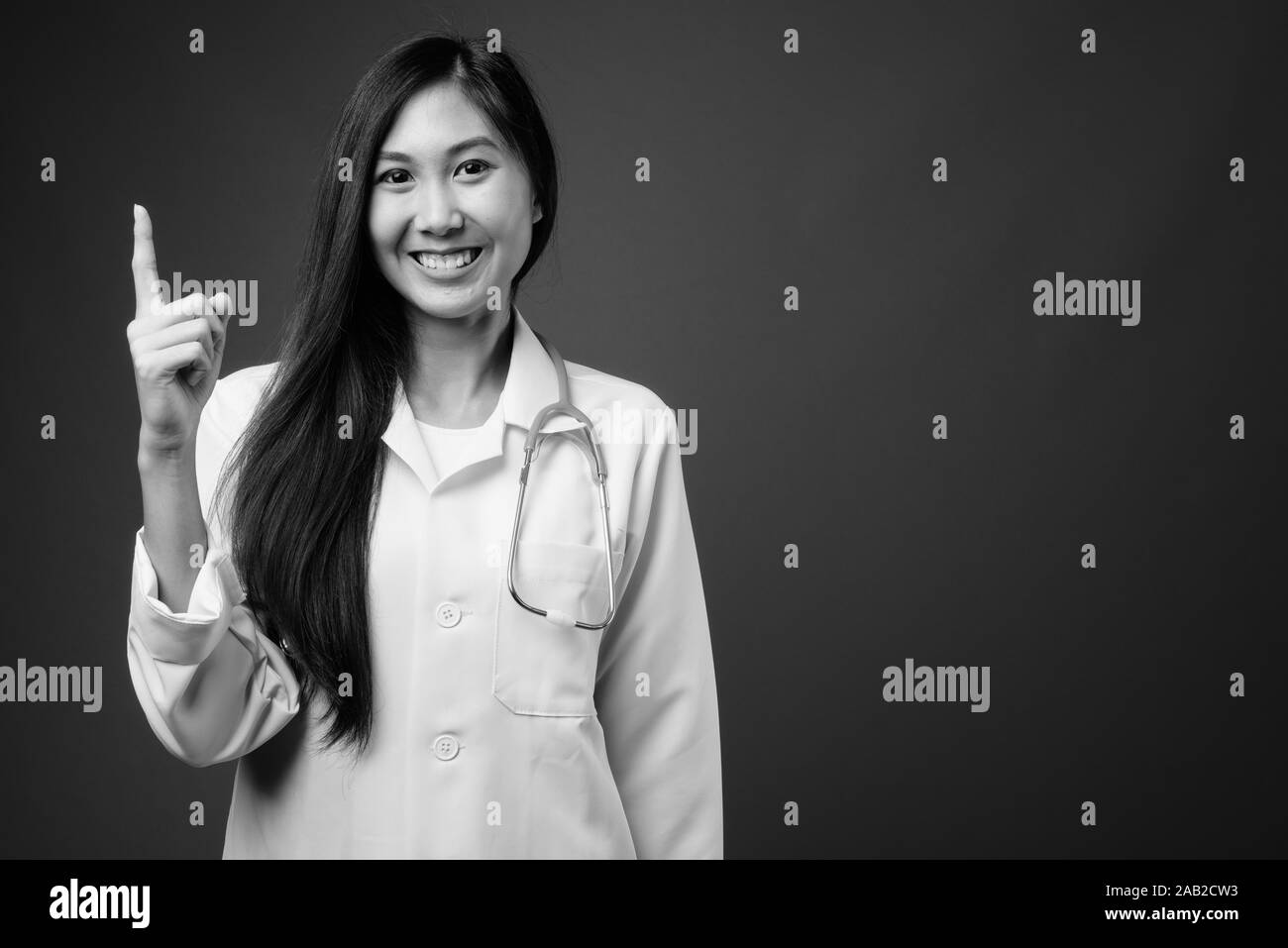 Young beautiful Asian woman doctor in black and white Stock Photo - Alamy